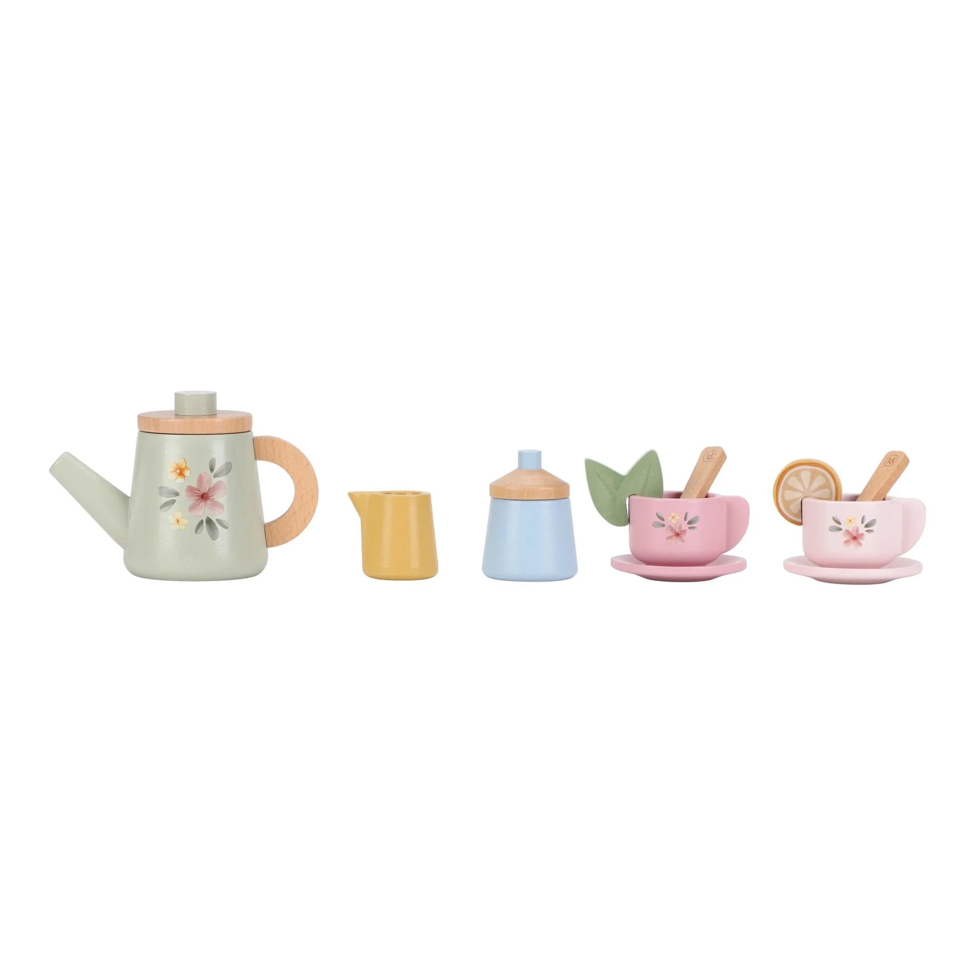 It includes Tea cups, milk jug, and sugar pot on wooden, mint and lemon slice.