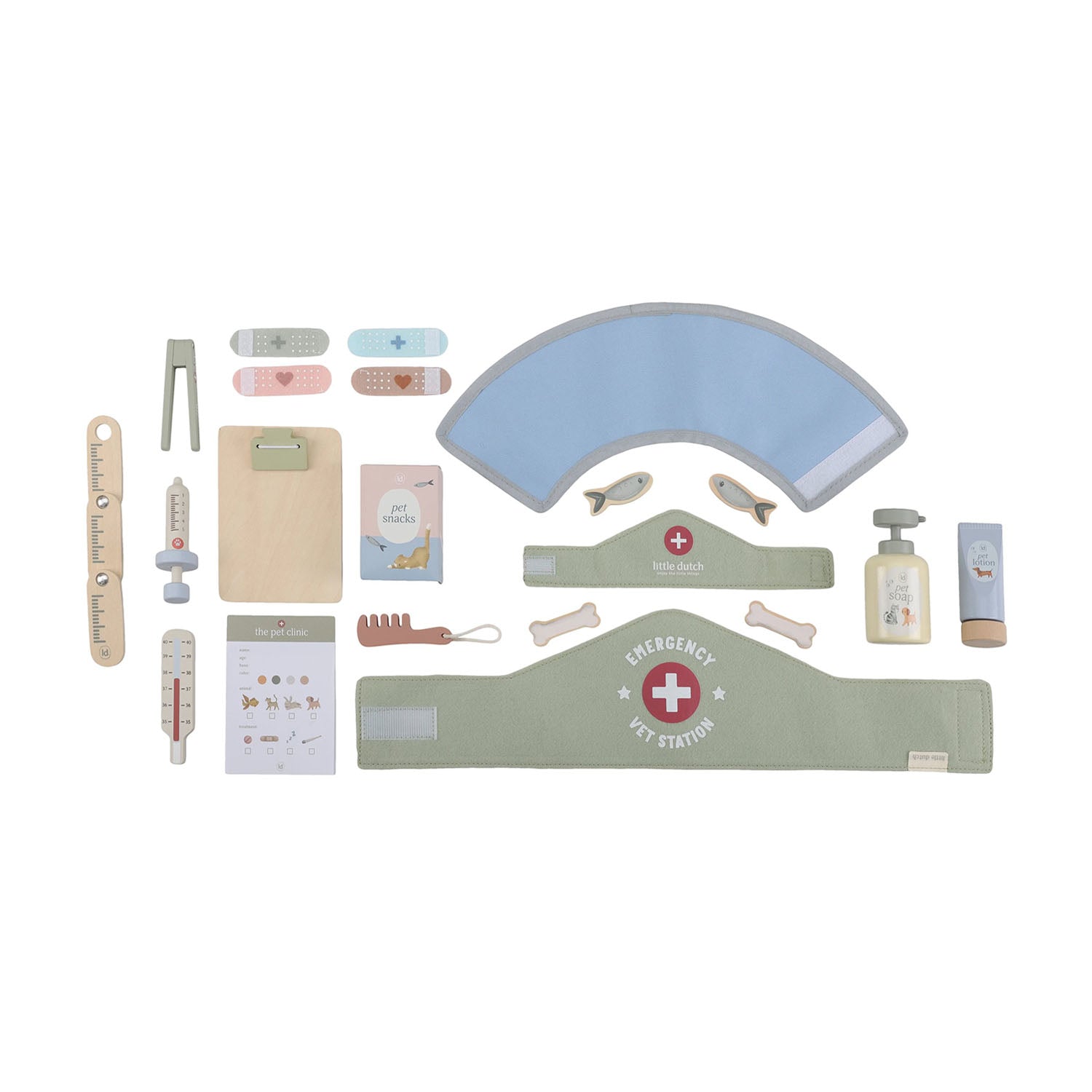 Band-aids and pretend medical tools in a white background.