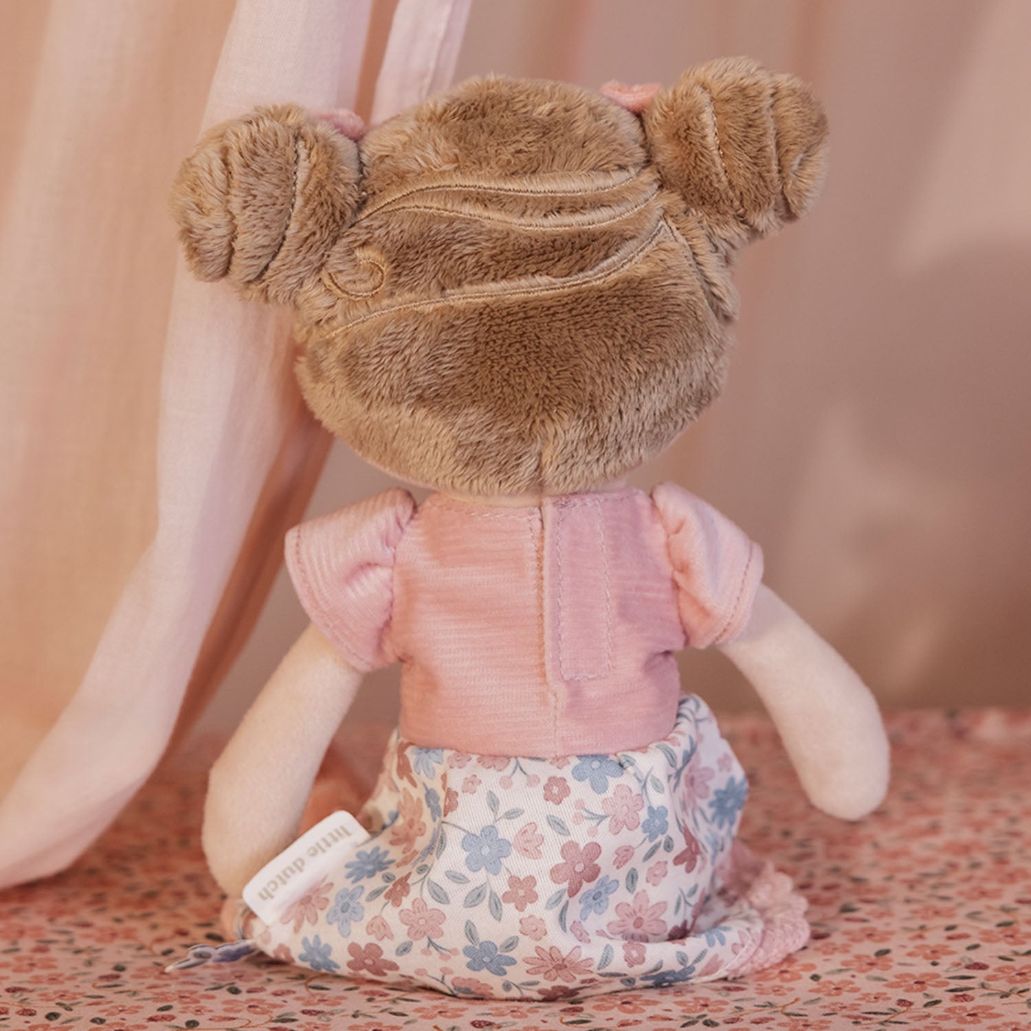 Cute Rosa cuddle doll with bows, boots and floral skirt