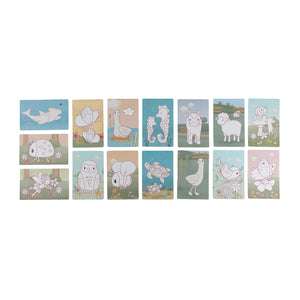 Close-up view of Fairy Garden themed trace-and-draw inspiration cards laid out