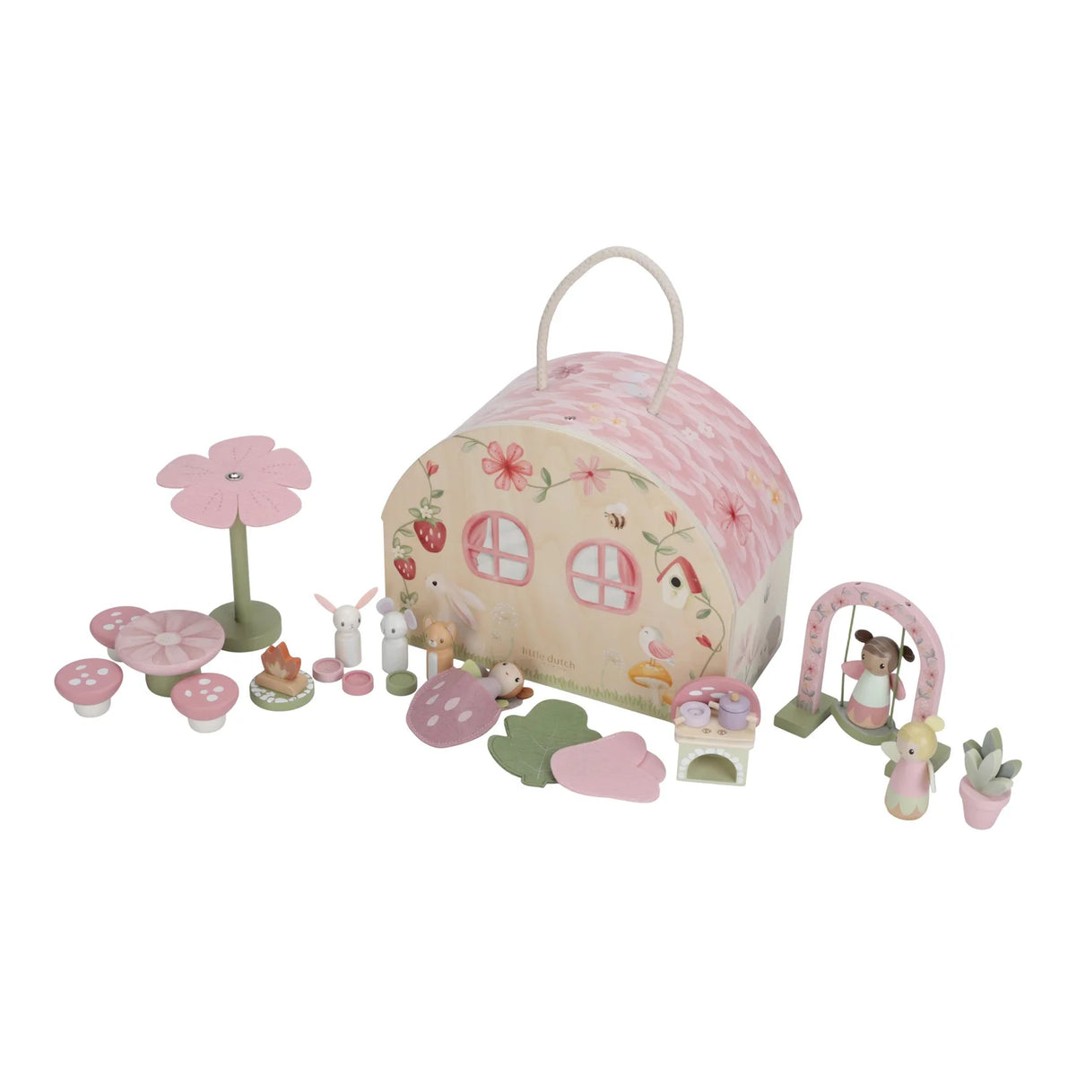 Child playing with Little Dutch Fairy House – unfolding and arranging play pieces
