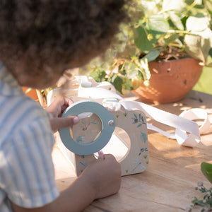 Outdoor bug catching activity with Little Dutch toy