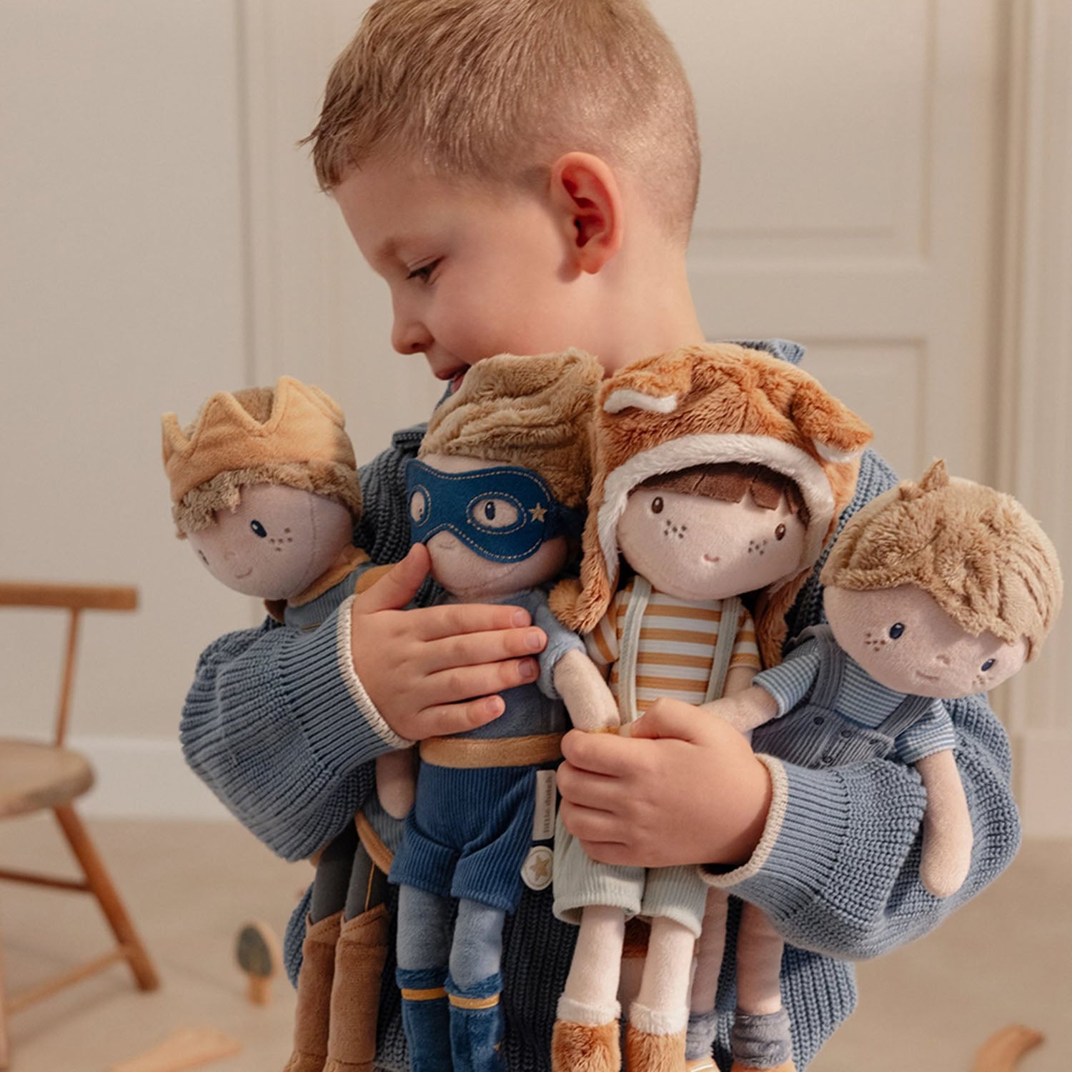 : A cuddly blue superhero doll for children, designed for imaginative play and comfort.