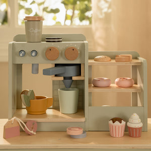 A warm lifestyle shot of the Little Dutch Coffee Corner set fully assembled and staged in a playroom setting.