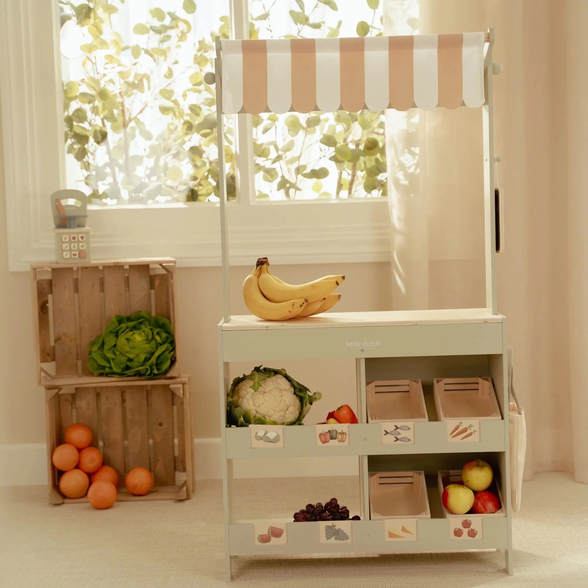 Little Dutch market stall in modern playroom setup.