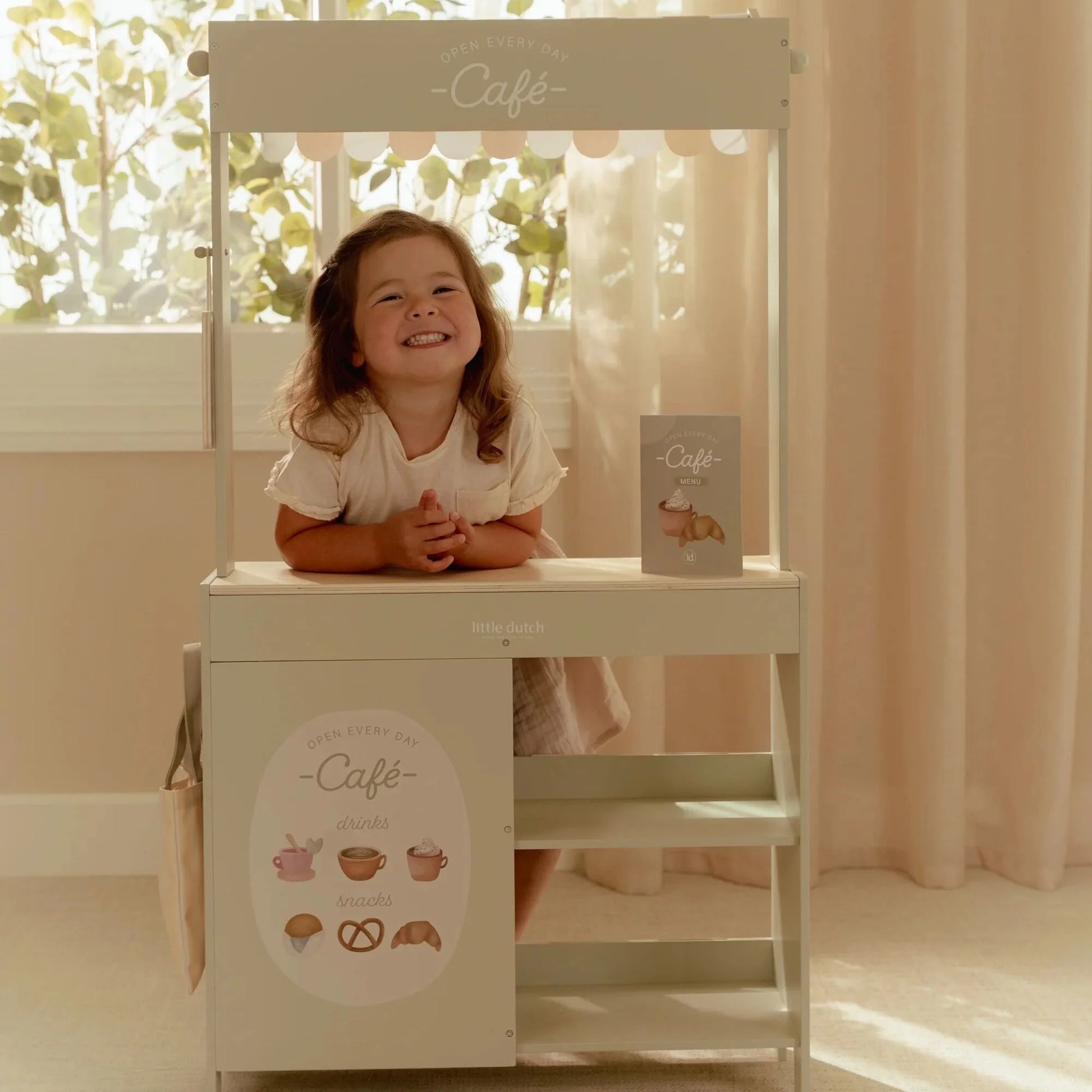 Kids’ pretend play market with Little Dutch wooden stall.