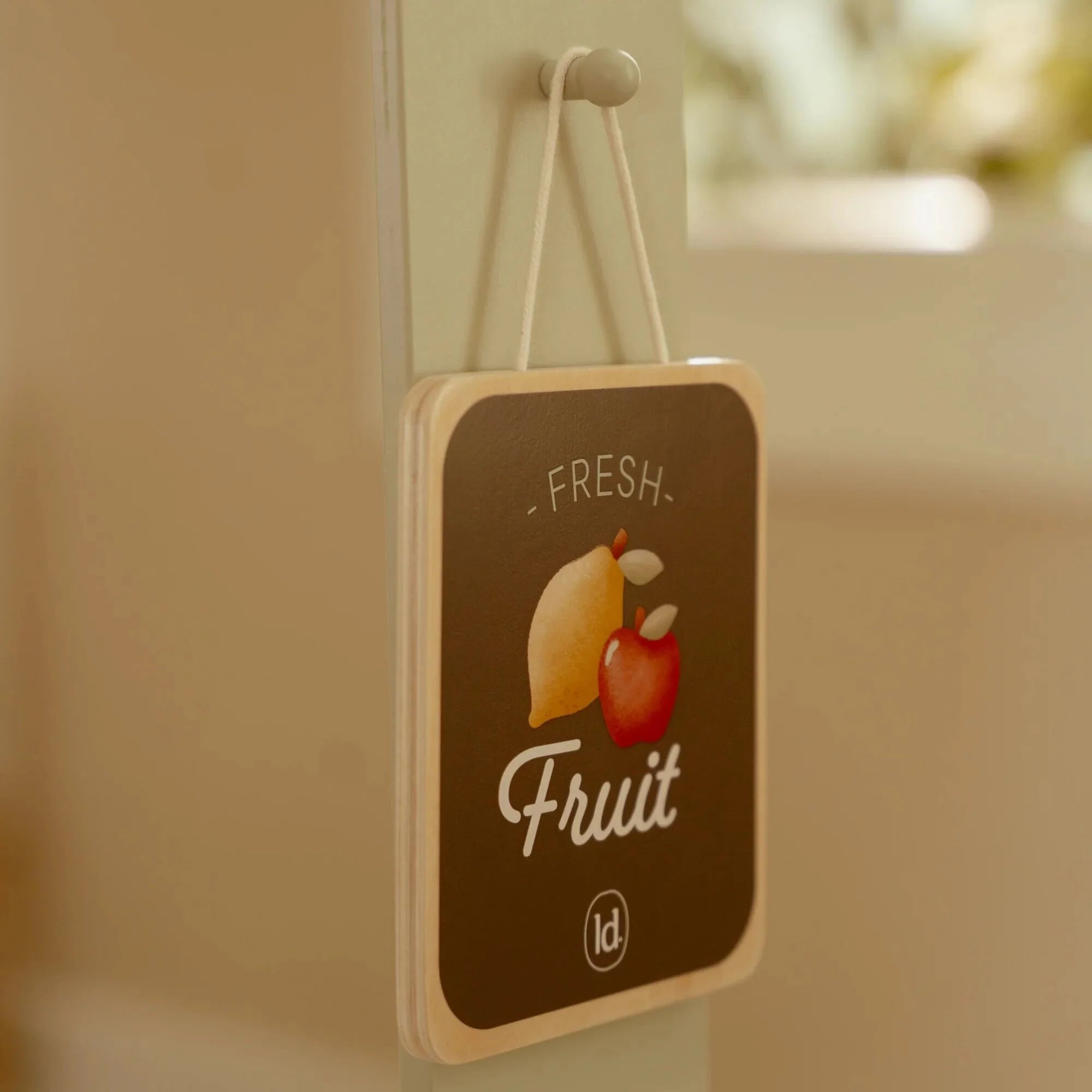 Little Dutch toy stall with chalkboard and illustrated cards.