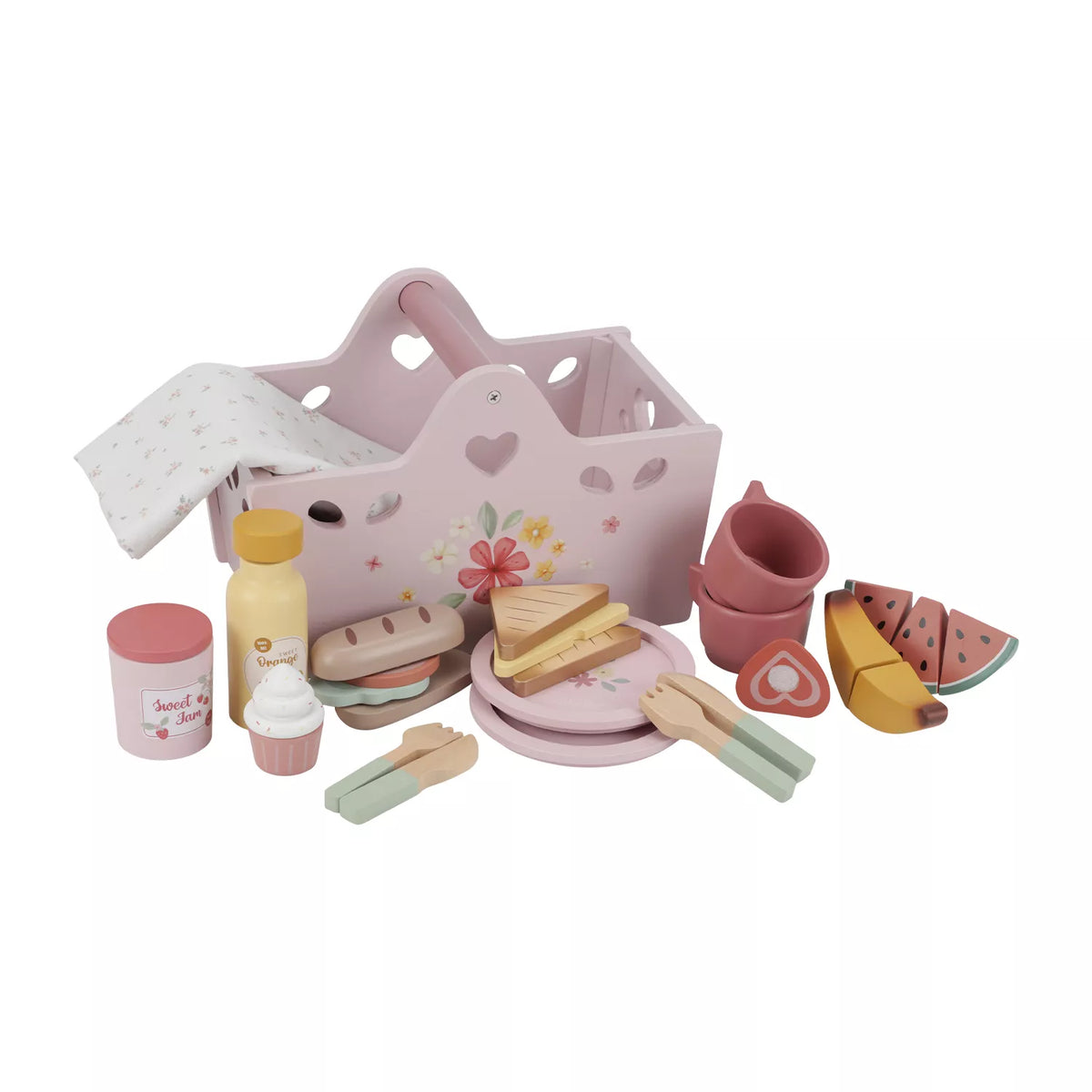 A children's wooden play kitchen set with a pink basket, plates, cups, utensils, food pieces, and small accessories, photographed on a clean white background.