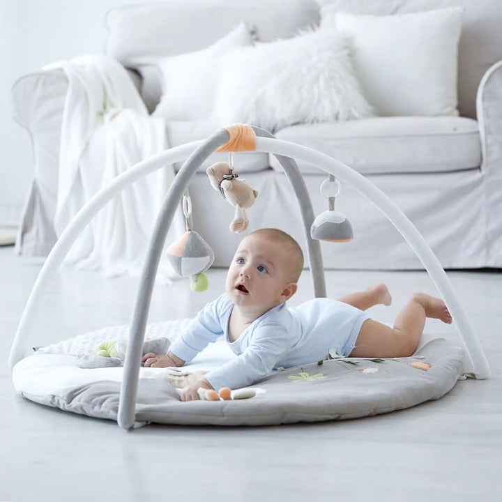 Baby playing with Luxury Musical Baby Playmat - Safari Play Gym