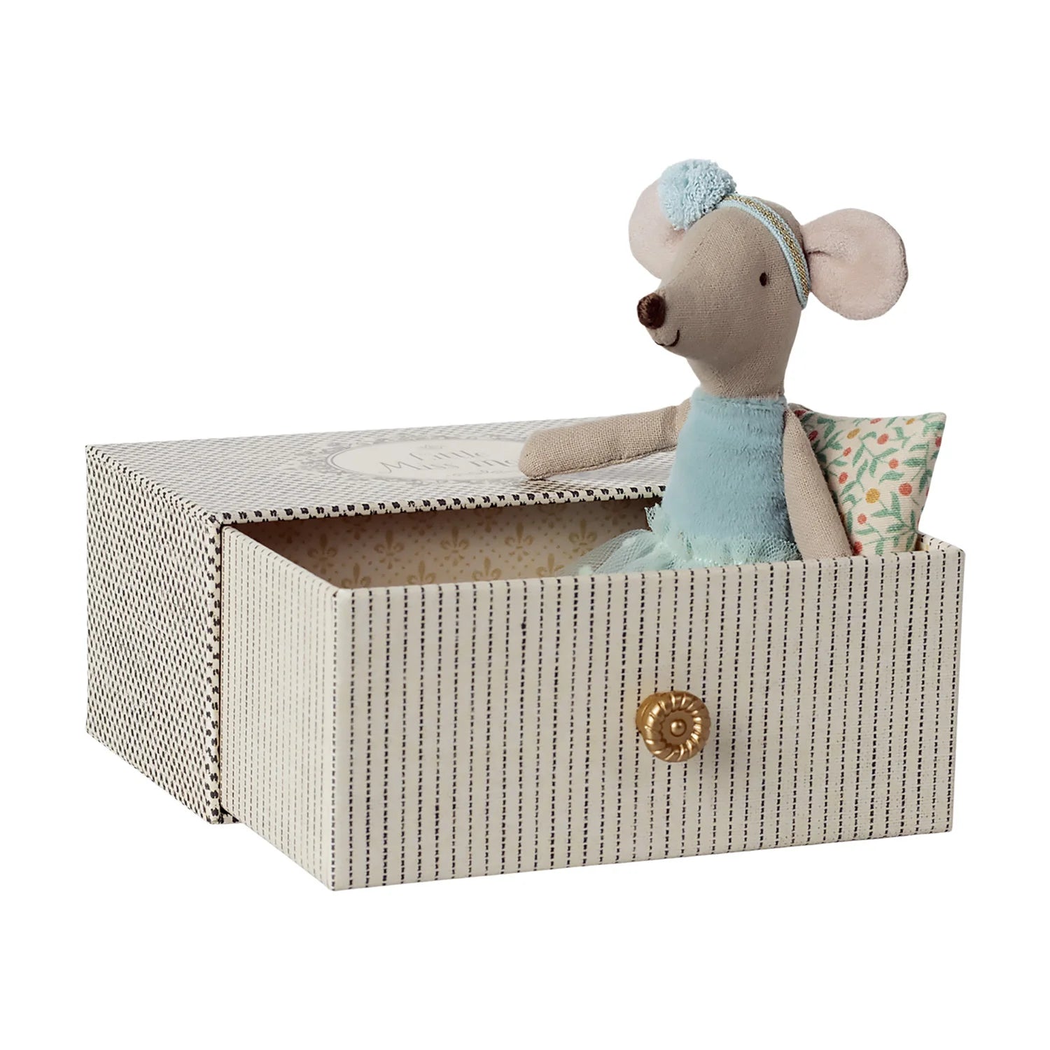 Maileg mouse is sitting in the matchbox in a white background.