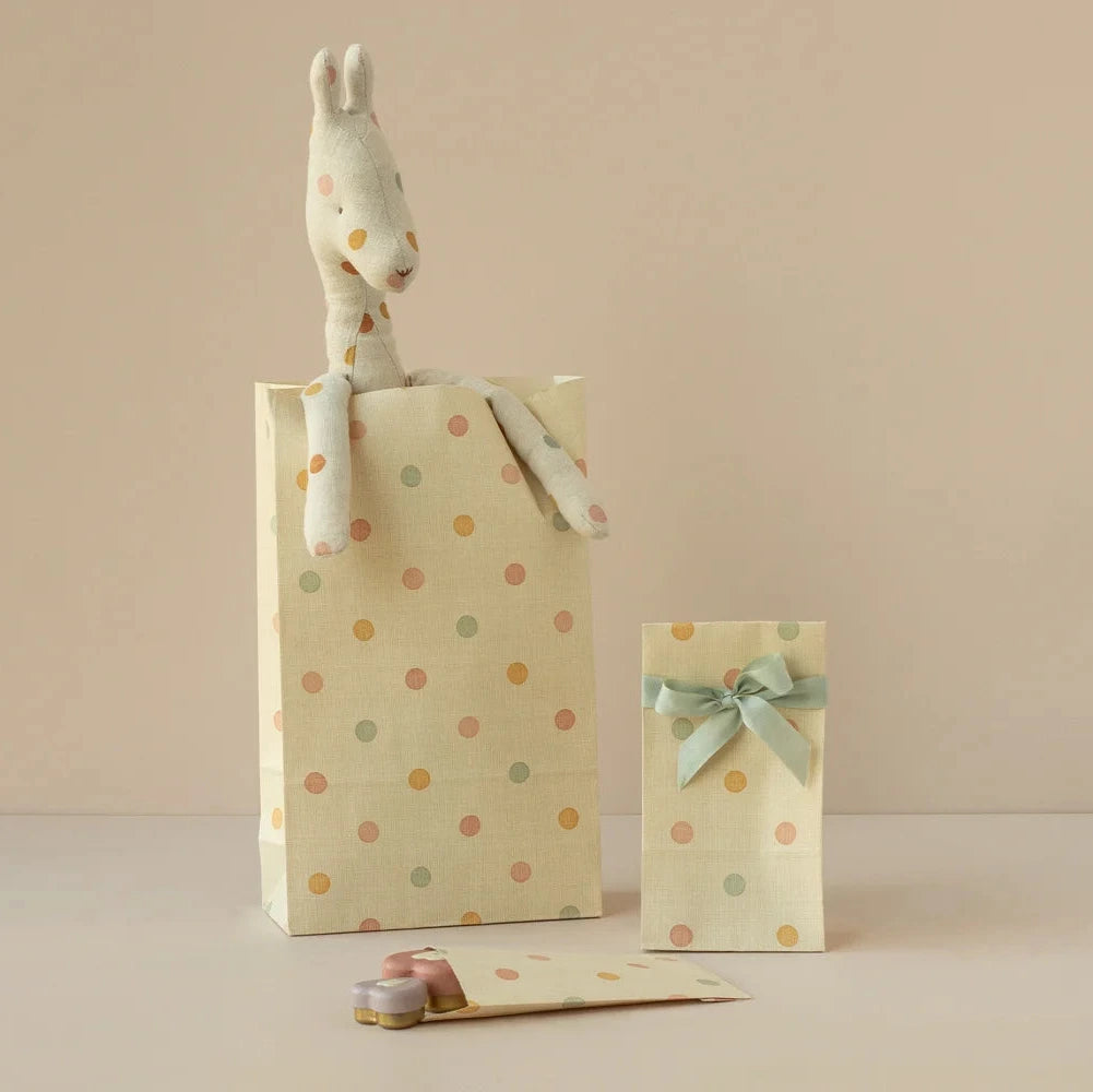 Maileg micro gift bags arranged for party favors or gift wrapping.