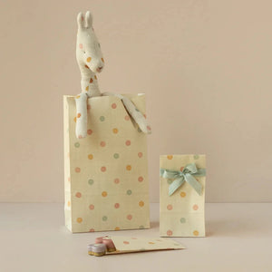 Maileg micro gift bags arranged for party favors or gift wrapping.
