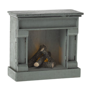 Miniature fireplace is a great toy for fostering imagination and creativity.