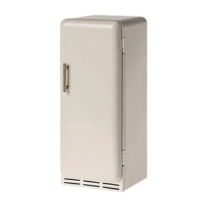 Maileg Miniature Fridge in off white color, made from metal with a magnetic lock and frosted shelves, designed for dollhouse play.