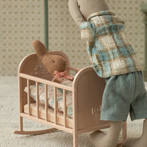Includes soft cotton sleeping bag and polyester-filled mattress.