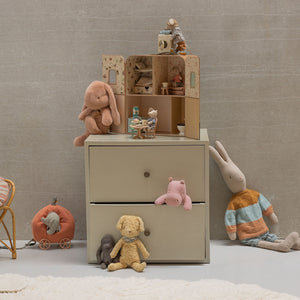 Maileg SuitCasa styled with tiny wooden furniture and mouse dolls.