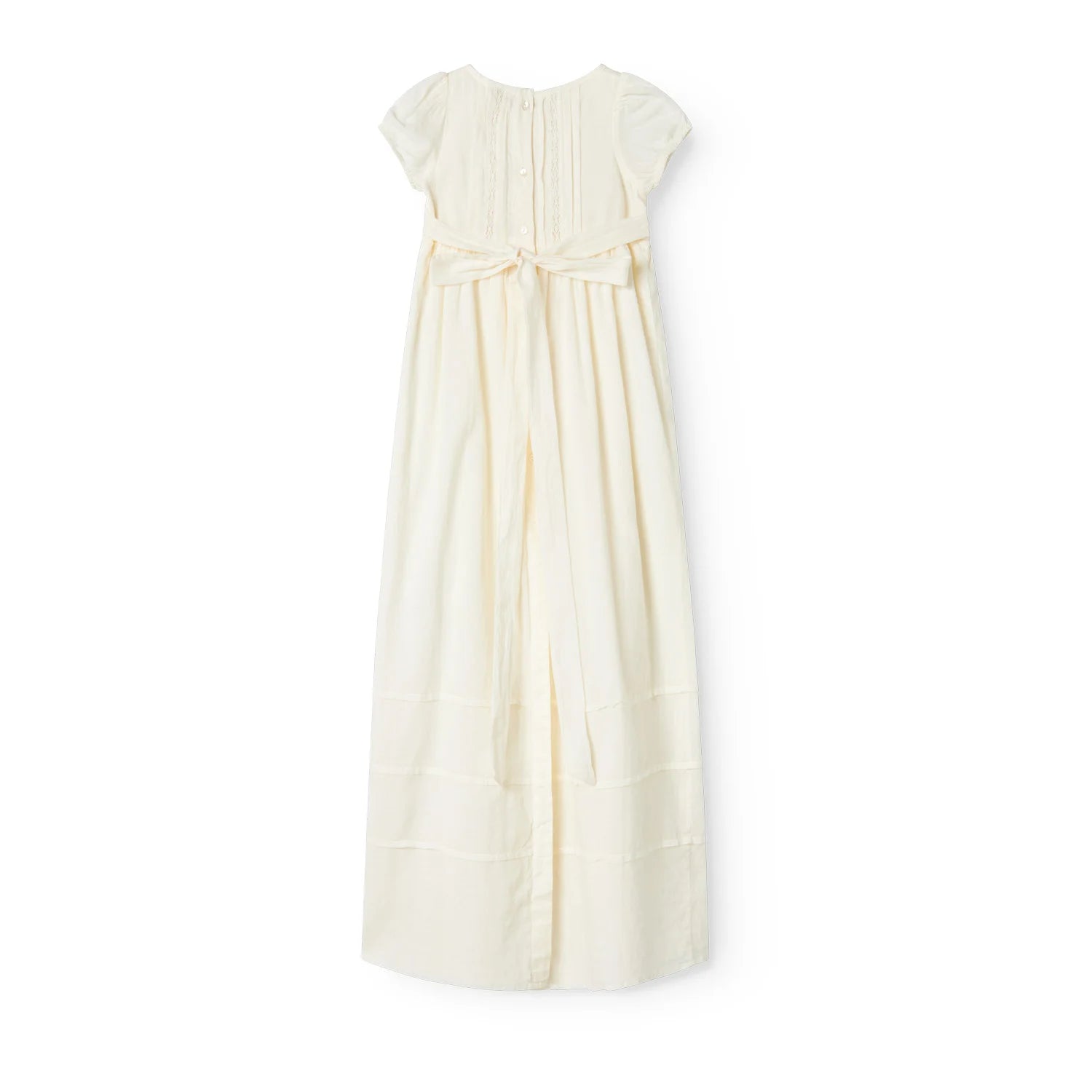 Daisa Long Christening Dress laid out, highlighting soft fabric and length.