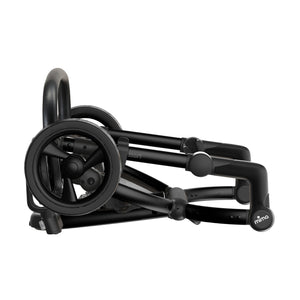 Mima Xari 4G stroller chassis black folded for storage.