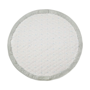 Round light green playmat laid flat, displaying the surface with a subtle green pattern.