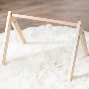 MiniDream lightweight wooden frame baby play gym on floor setup