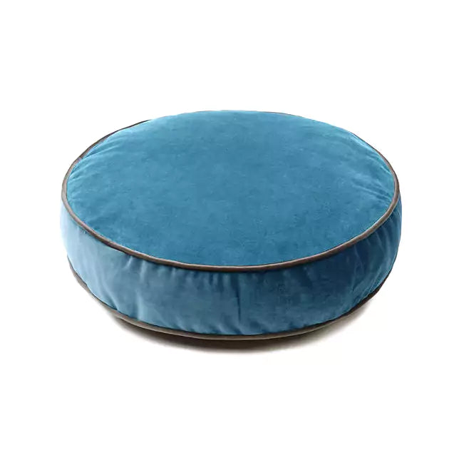 MiniDream soft round tummy time cushion for nursery or playroom.