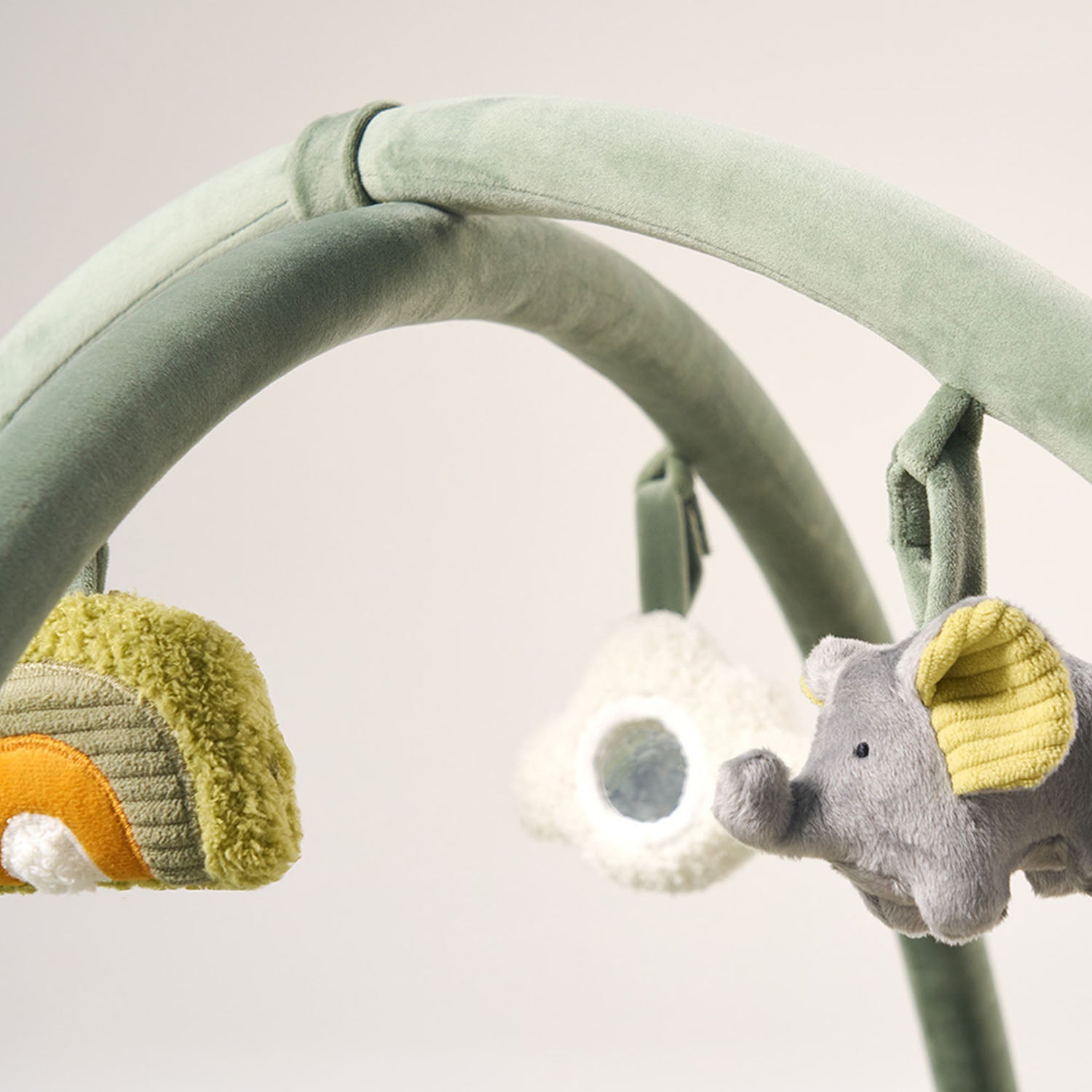 MiniDream activity gym and playpen has 4 hanging toys.