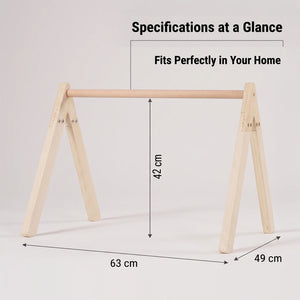 Dimension diagram of the MiniDream wooden play gym, indicating a length of 63 cm, a base width of 49 cm, and an assembled height of 42 cm