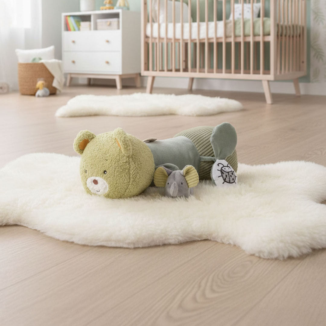 MiniDream tummy time roller in a nursery