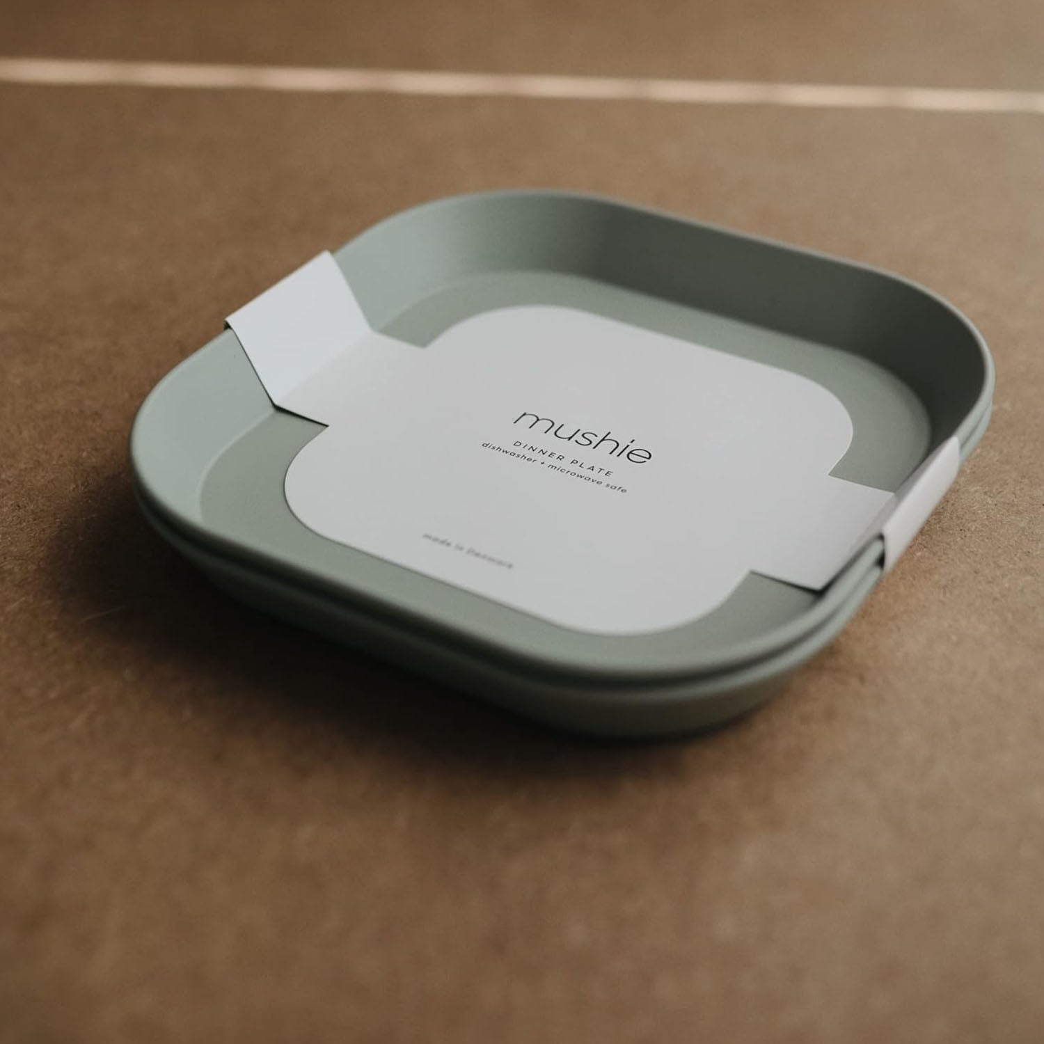 Set of mushie dinnerware plates.