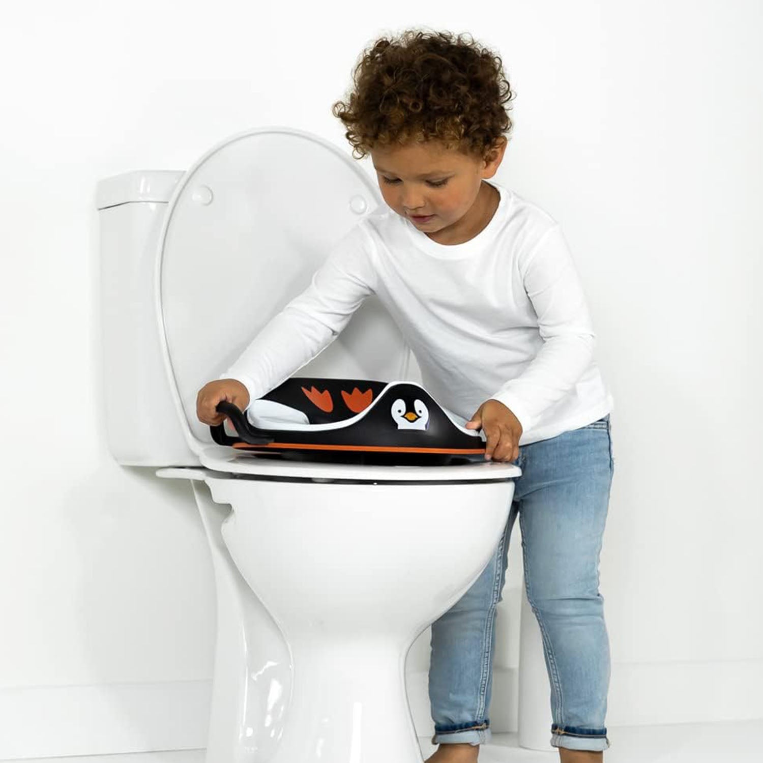 My Little Trainer Seat showing secure fit on adult toilet seat