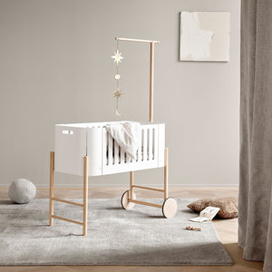 Baby mobile holder mounted on co-sleeper side rail