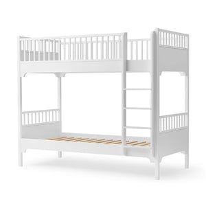 White bunk bed with a simple, modern Scandinavian design