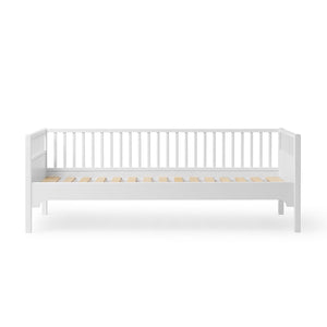 Wooden frame with vertical bars on the back and sides