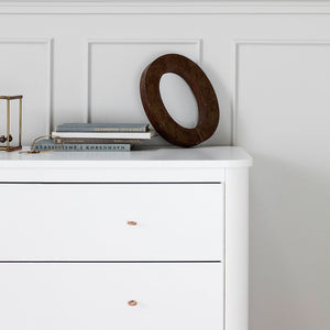 Child-safe dresser design with rounded corners and hidden screws