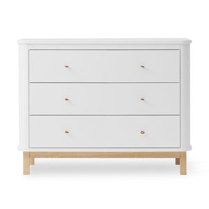 Elegant storage unit with leather loop handles in a Scandinavian design style