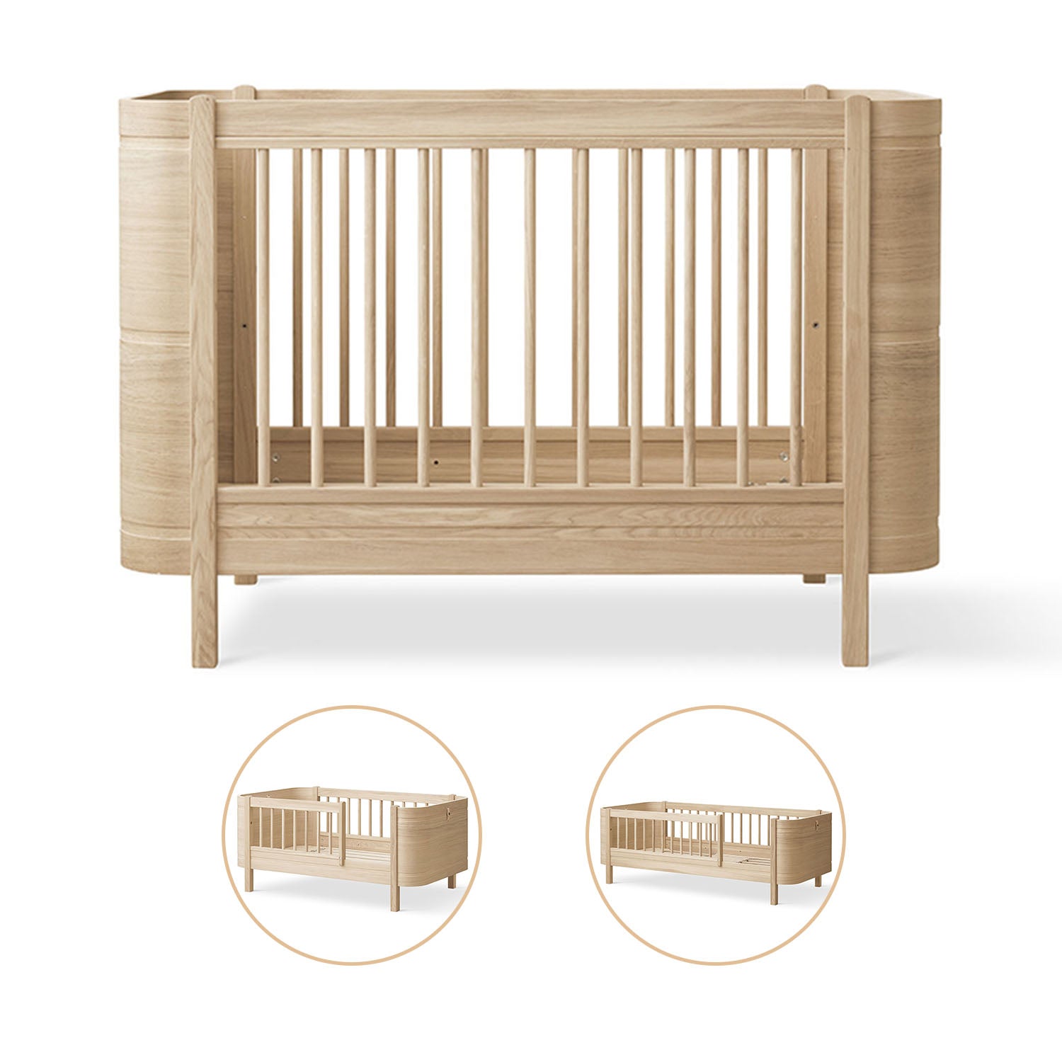 Wooden crib with two inset images on a white background