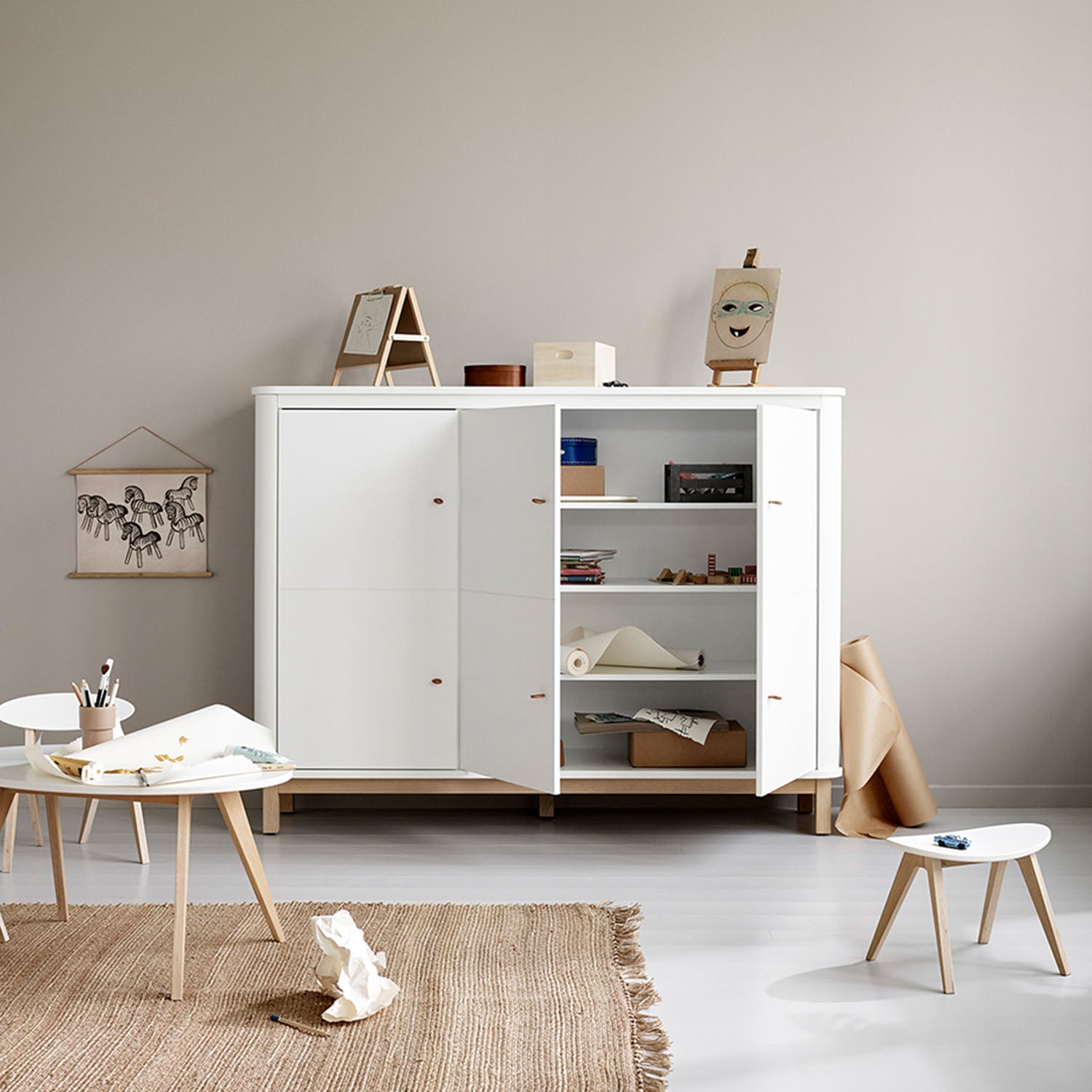 Compact storage cabinet with shelves and hanging space