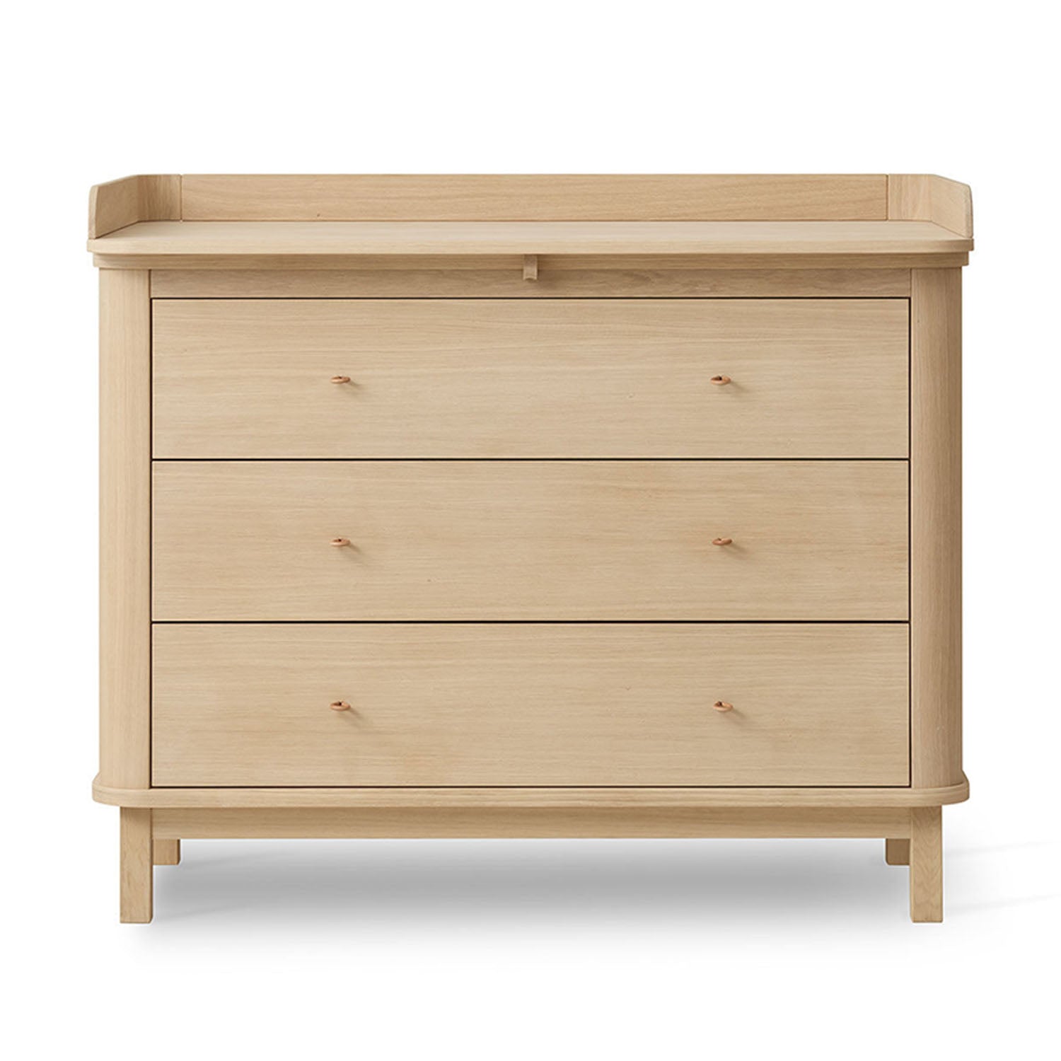 Nursery dresser with changing top and rounded edges.