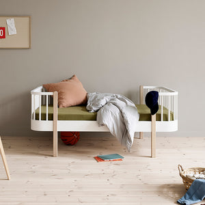 Wood original junior bed in a child’s room