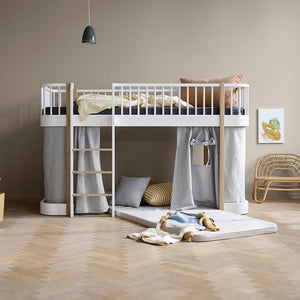 Oliver furniture neutral coloured mattress in a kids bedroom setting