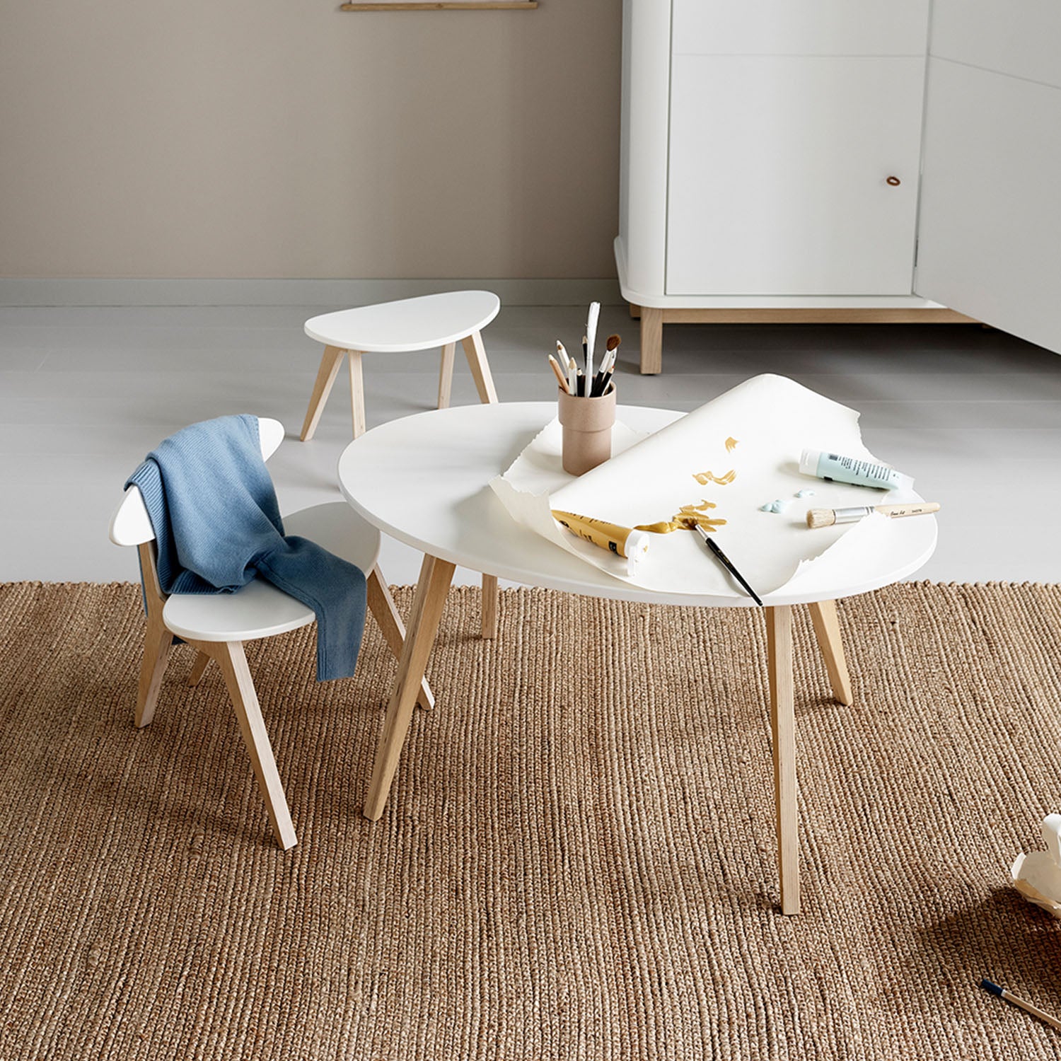 Small toddler table designed for play, drawing, and activities.