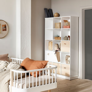 Interior styling shot showing shelving unit integrated into modern home décor