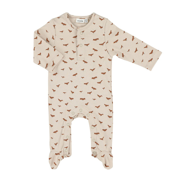Close-up of the onesie's Babbling Birds print and soft organic cotton