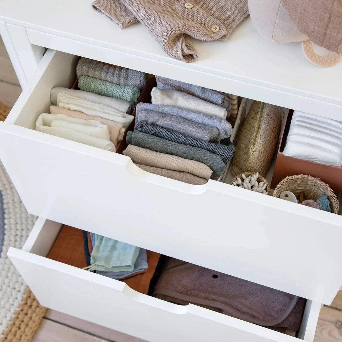 Sebra changing unit with drawers open showing internal storage space and organisation