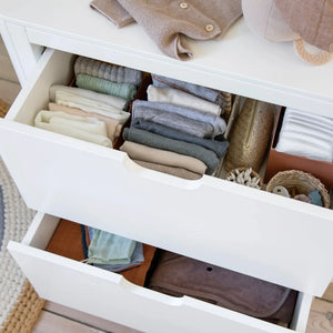 Sebra changing unit with drawers open showing internal storage space and organisation