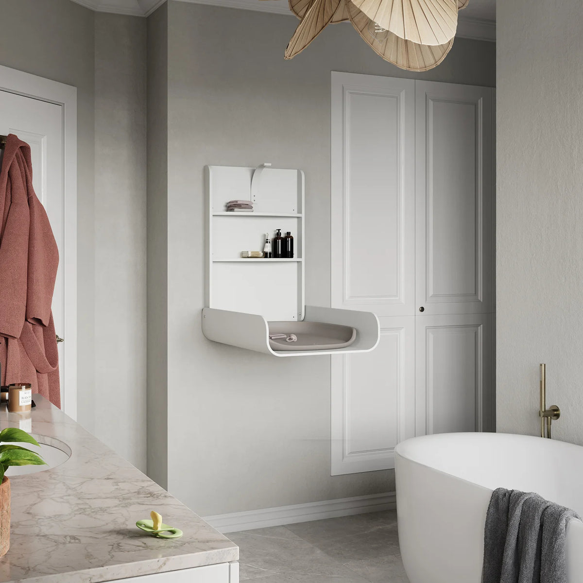Close-up of Sebra wall changing table white finish folded down