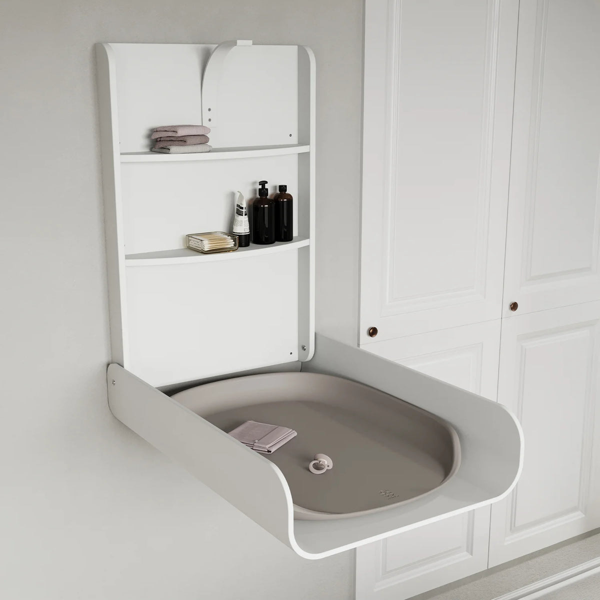 Sebra wall changing table mounted in neutral family bathroom