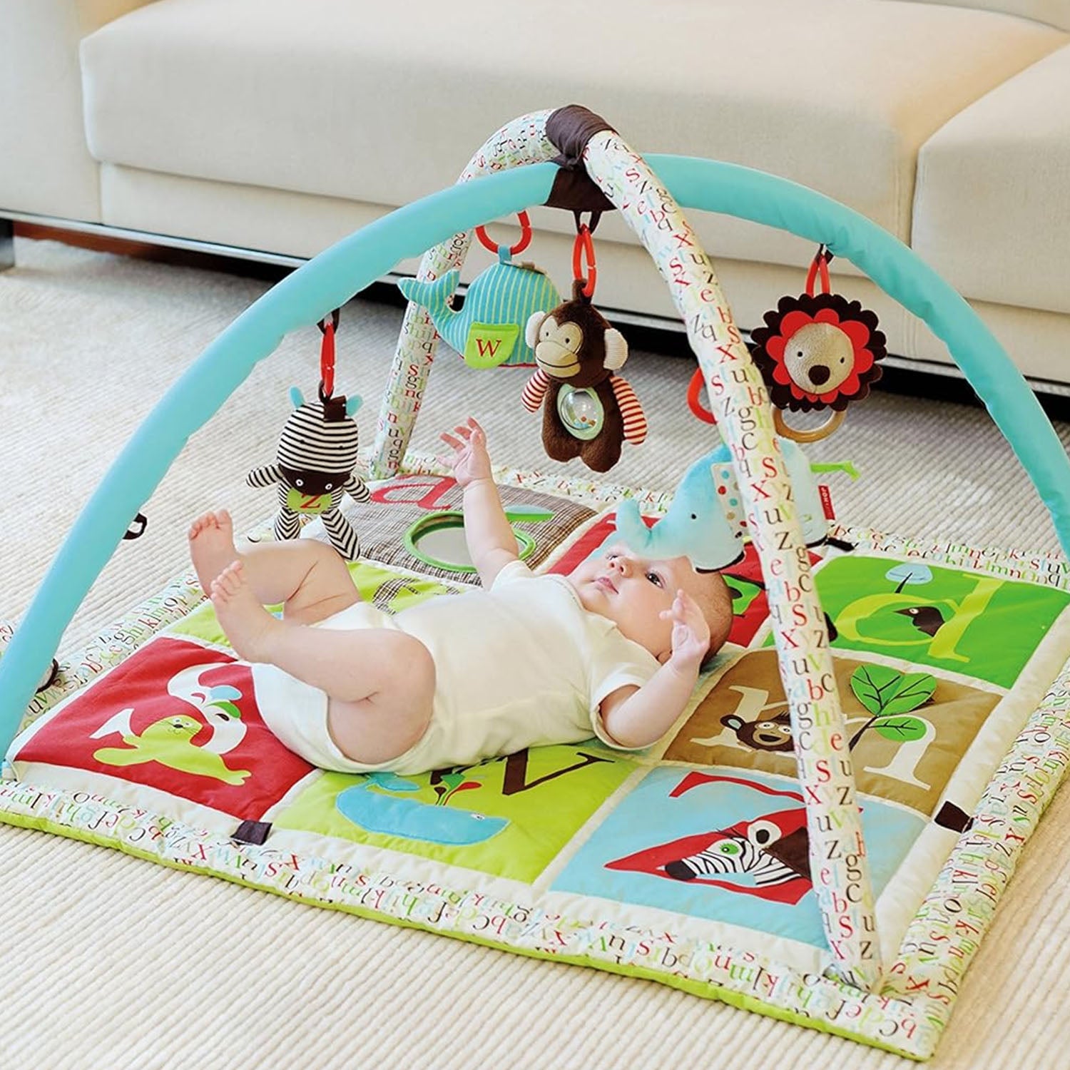 Infant play gym with removable mirror, crinkle and squeaky toys