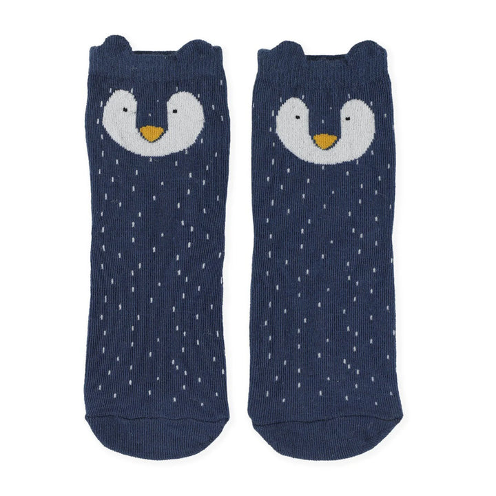 Pair of Mr. Penguin socks laid flat, showing the design