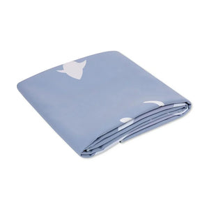 Folded beach towel in a white background.